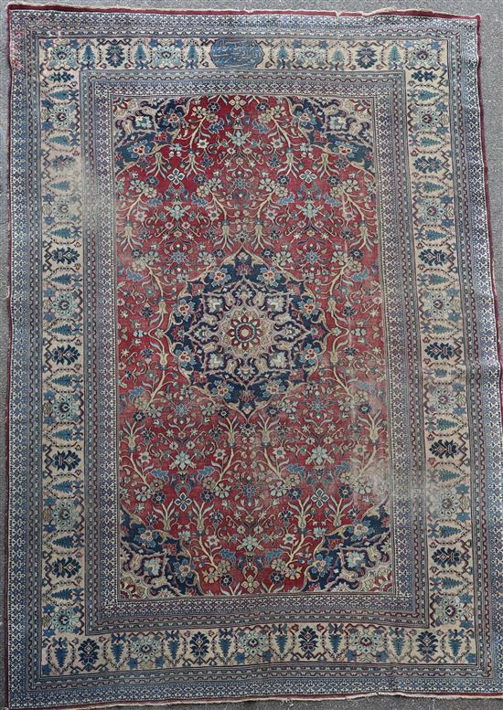 A Persian blue ground carpet, 17ft 11in by 10ft 1in.